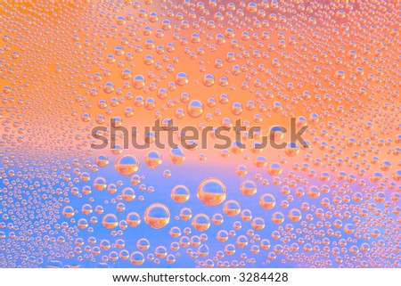 Background of bubbles in orange red and blue colours