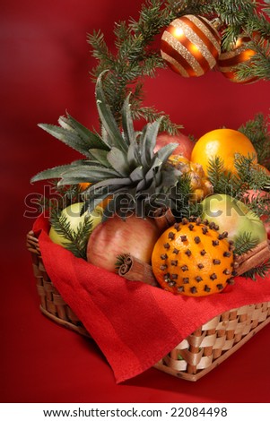 Decorated Christmas basket with fruit