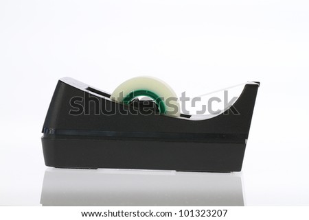 Sticky tape dispenser isolated on white background
