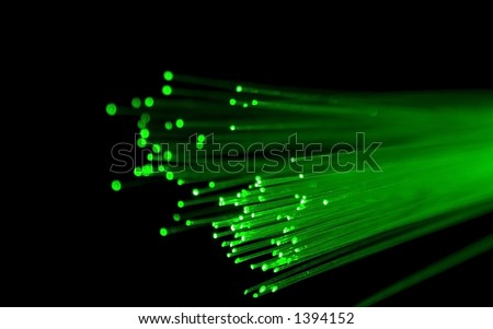 Optical fibers over black - concept for speed, technology, communication