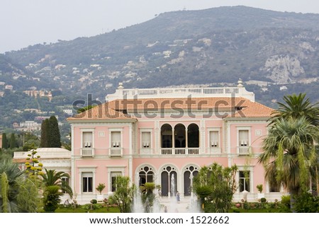 Amazing luxurious villa with gardens in the French Riviera with the alps in the background