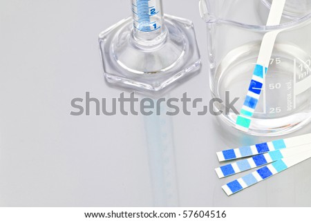Lab glassware with PH indicator
