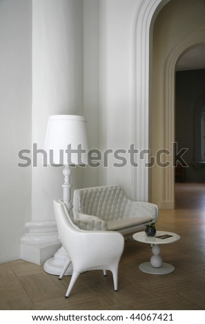 Interior with white designer furniture