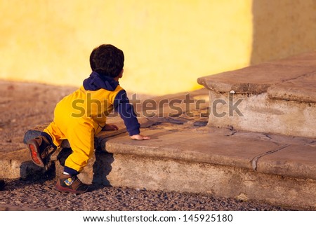kid climb up to steps