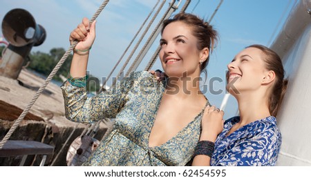 women enjoy their life on the yacht