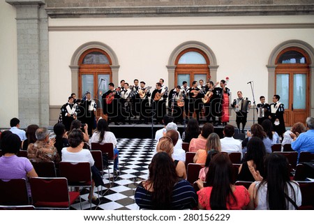 MEXICO CITY, MEXICO - APR, 18, 2015: Estudiantina or Mexican Band of Students playing in the Chapultepec Castle. Mexico City, Mexico on Apr, 18, 2015.