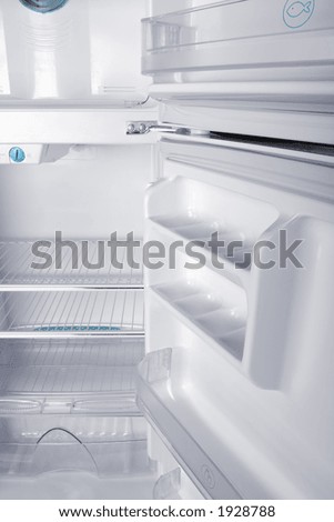Small refrigerator in white background