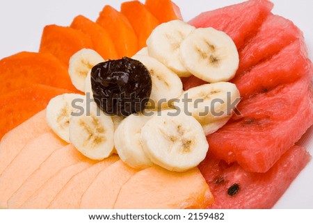 Fruit salad with melon, papaya, watermelon and banana