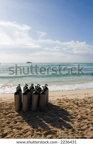 Compressed air tanks for scuba diving on the beach