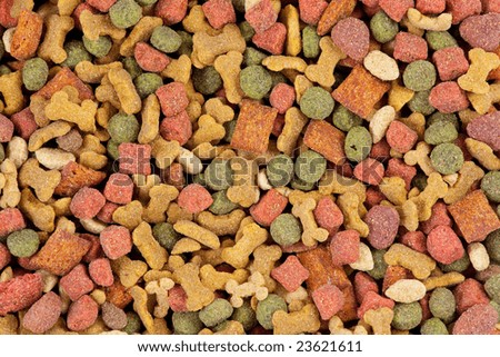 Top  view of dog food. Red, green and brown dog treats.