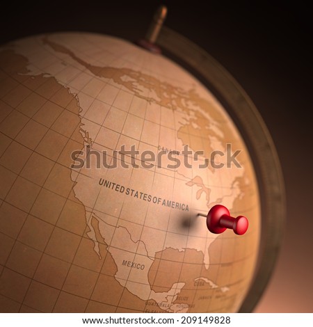 Antique globe with the United States marked by the pin. Clipping path included.