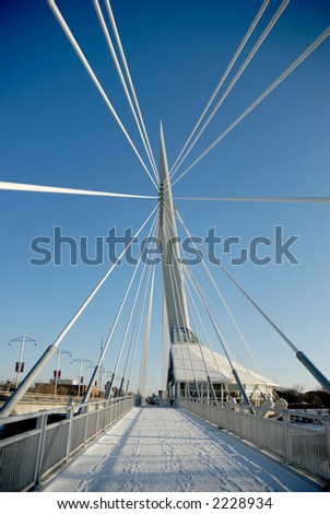 Shot of Provencher Bridge, from the west end facing east, with support cables converging to a focal point.