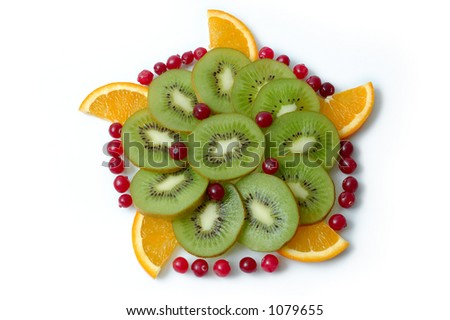 Exotic fruits dish, kiwi, orange, cranberries;