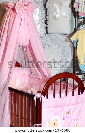 Pink nice baby bed in furniture shop