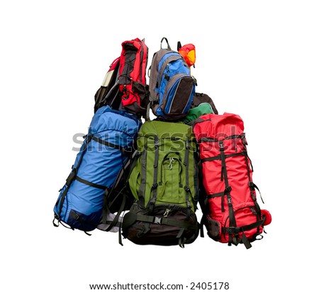 Pile of backpacks - backpacking concept isolated on white with clipping path