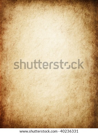 Antique yellowish parchment paper grungy background texture