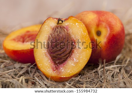 Close up  of an Ontario grown fresh peach. Cut open to see the juice