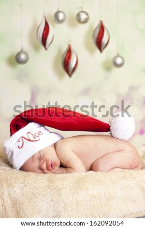 Sleeping baby santa
