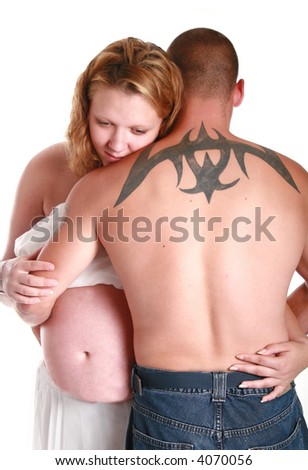 stock photo : Tattoo on mans back and holding his pregnant girlfriend