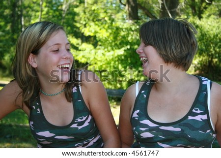 Two best friends laughing together