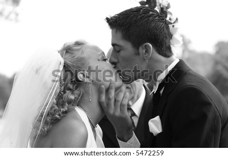 couple kissing images. couple kissing at wedding