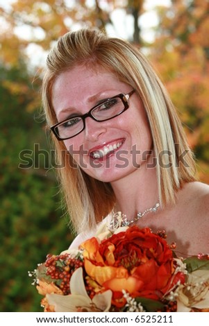 Beautiful bridesmaid in a fall wedding