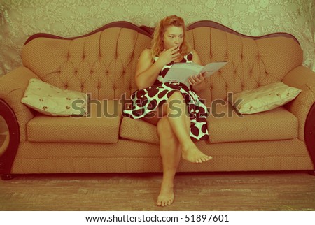 vintage creative styled image with woman reading a book and looking shocked.