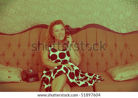 Woman on the telephone with a vintage creative touch.