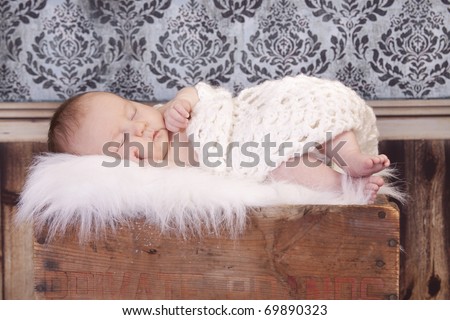 Sleeping baby with vintage background