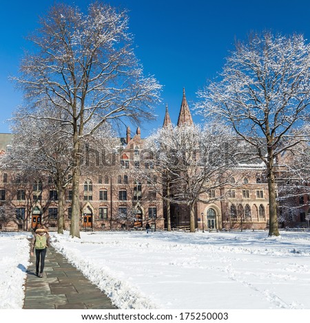 Yale university buildings in winter sunlight with snow and blue sky