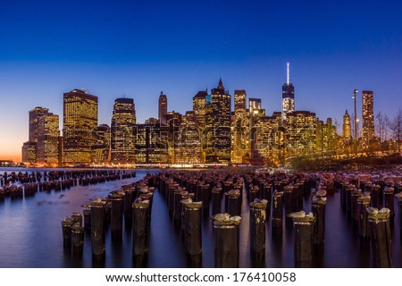 Manhattan Skyline with the One World Trade Center building at twilight, New York City
