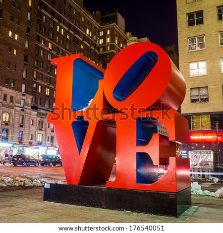 NEW YORK - February 10: Love sculpture at night on February 10, 2014 in New York. The famous monument by Robert Indiana is located on 6th Avenue.