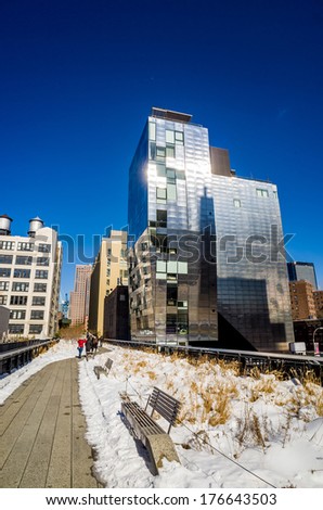 NEW YORK CITY - February 10: High Line Park in NYC on Feb. 10, 2014. In 2009 this former elevated freight railroad spur on NYC\'s west side opened as an aerial park garden and continues to expand.