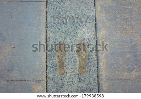 PHILADELPHIA - FEB 27: The Rocky Steps in Philadelphia, USA, on February 27,2014 The bronze inlay of sneaker footprints with the name 