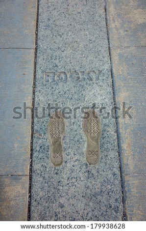 PHILADELPHIA - FEB 27: The Rocky Steps in Philadelphia, USA, on February 27,2014 The bronze inlay of sneaker footprints with the name \