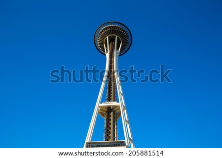 SEATTLE - JULY 5:  The Space Needle in Seattle on July 5, 2014. A symbol of Seattle. It was built in the Seattle Center for the 1962 World\'s Fair.