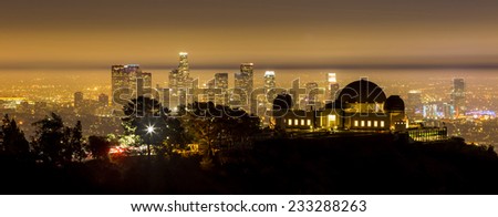 The Griffith Observatory and Los Angeles city skyline at twilight CA