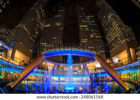 SINGAPORE-DEC 16, 2014:  Fountain of Wealth in Singapore on December 16, 2014.  Dancing Fountain Night Show at Suntec in SUNTEC CITY, SINGAPORE.