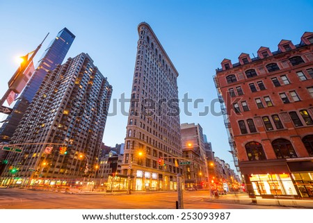 NEW YORK CITY - FEB 11: Flat Iron building, considered to be one of the first skyscrapers ever built, with New York City street view. February 11, 2015 in Manhattan, New York City.