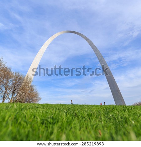 St. Louis Gateway Arch in Missouri with clouds and blue sky