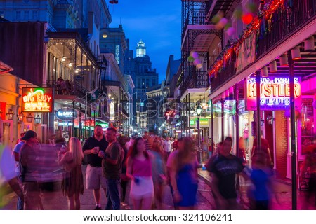 NEW ORLEANS, LOUISIANA - AUGUST 21: Pubs and bars with neon lights  in the French Quarter, downtown New Orleans on August 21, 2015.