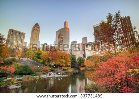 Central Park in Autumn with colorful trees and skyscrapers