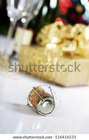 champagne cork on Christmas tree background