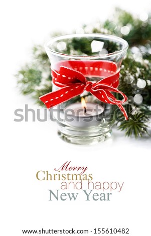 Christmas composition with candle and decorations (with easy removable sample text)