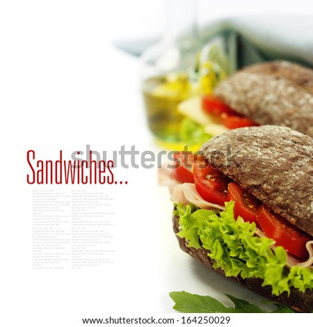 Grain bread sandwiches with ham,cheese and fresh vegetables over white - healthy eating concept (with easy removable sample text)