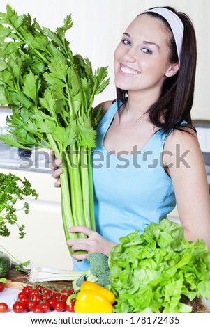Young Woman Cooking. Healthy Food - Vegetable Salad. Diet. Dieting Concept. Healthy Lifestyle.