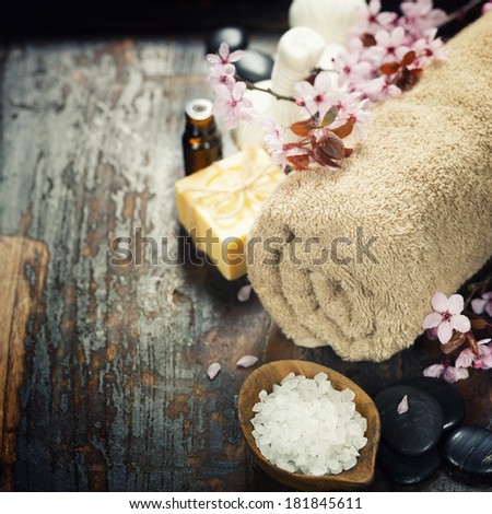 Spa setting over wooden background