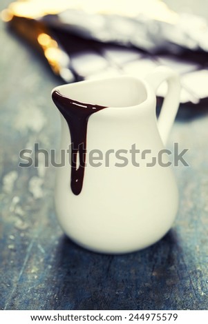 Delicious rich and thick chocolate sauce in a jug - food and drink
