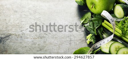 Fresh green vegetables on vintage background - detox, diet or healthy food concept