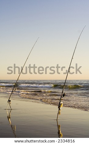 Two fishing rods set up for ocean fishing